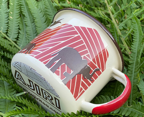 White enamel Ajiri Camping Mug. Ajiri Camping mug for premium Ajiri Kenyan Teas and Kenyan Coffee