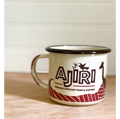 White enamel Ajiri Camping Mug. Ajiri Camping mug for premium Ajiri Kenyan Teas and Kenyan Coffee