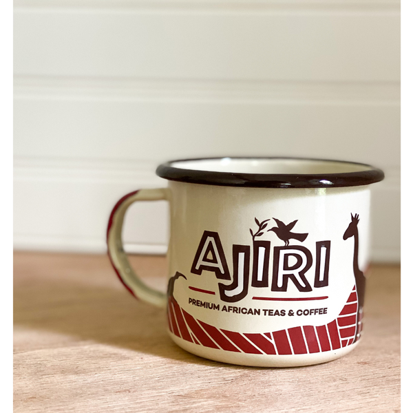 White enamel Ajiri Camping Mug. Ajiri Camping mug for premium Ajiri Kenyan Teas and Kenyan Coffee